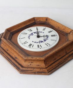 Horloge murale en bois et métal